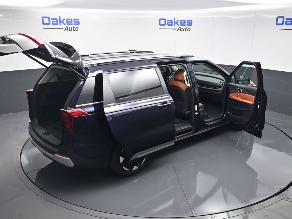 2026 Deep Chroma Blue Kia Carnival EX FWD Van