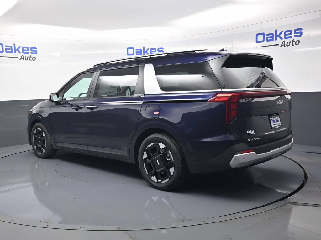 2026 Deep Chroma Blue Kia Carnival EX FWD Van