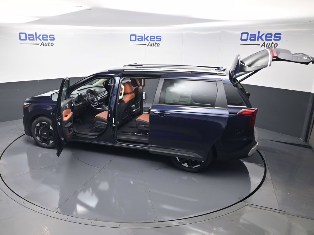 2026 Deep Chroma Blue Kia Carnival EX FWD Van