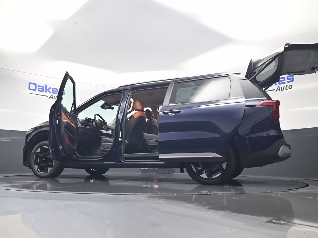 2026 Deep Chroma Blue Kia Carnival EX FWD Van