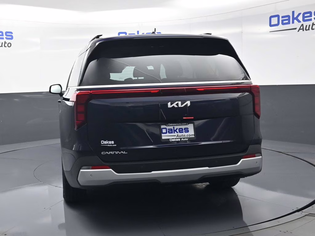 2026 Deep Chroma Blue Kia Carnival EX FWD Van