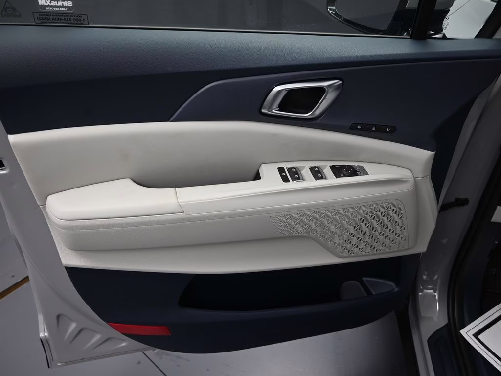 2026 Ceramic Silver Kia Carnival EX FWD Van