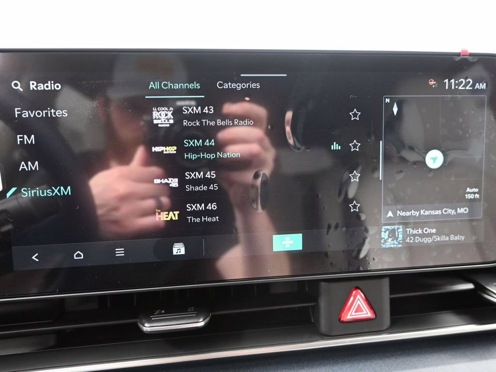 2026 Ceramic Silver Kia Carnival EX FWD Van