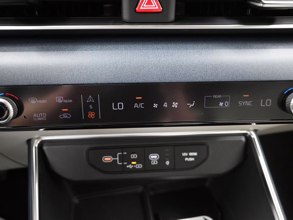 2026 Ceramic Silver Kia Carnival EX FWD Van