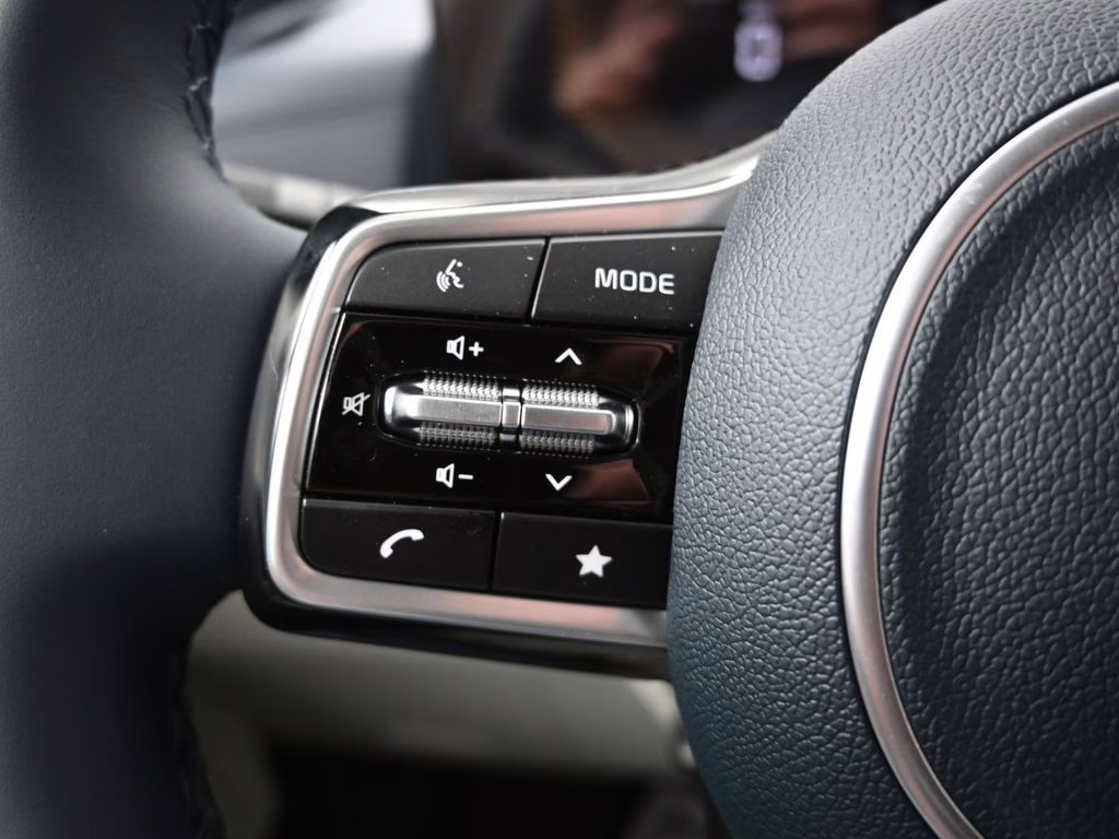 2026 Ceramic Silver Kia Carnival EX FWD Van