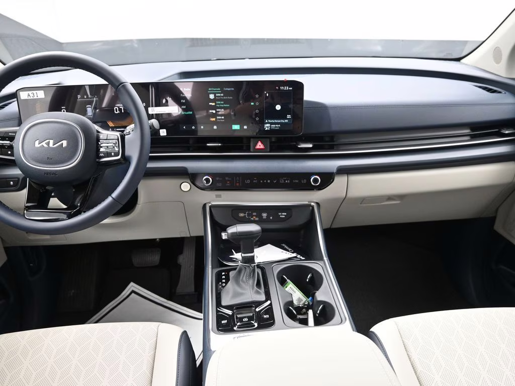 2026 Ceramic Silver Kia Carnival EX FWD Van