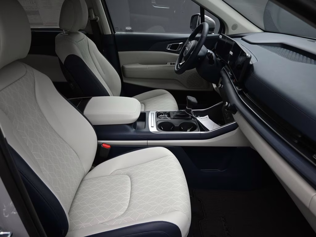 2026 Ceramic Silver Kia Carnival EX FWD Van