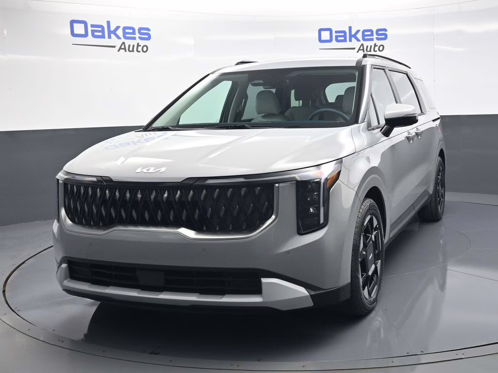 2026 Ceramic Silver Kia Carnival EX FWD Van