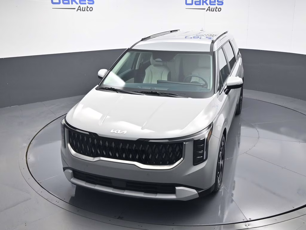 2026 Ceramic Silver Kia Carnival EX FWD Van