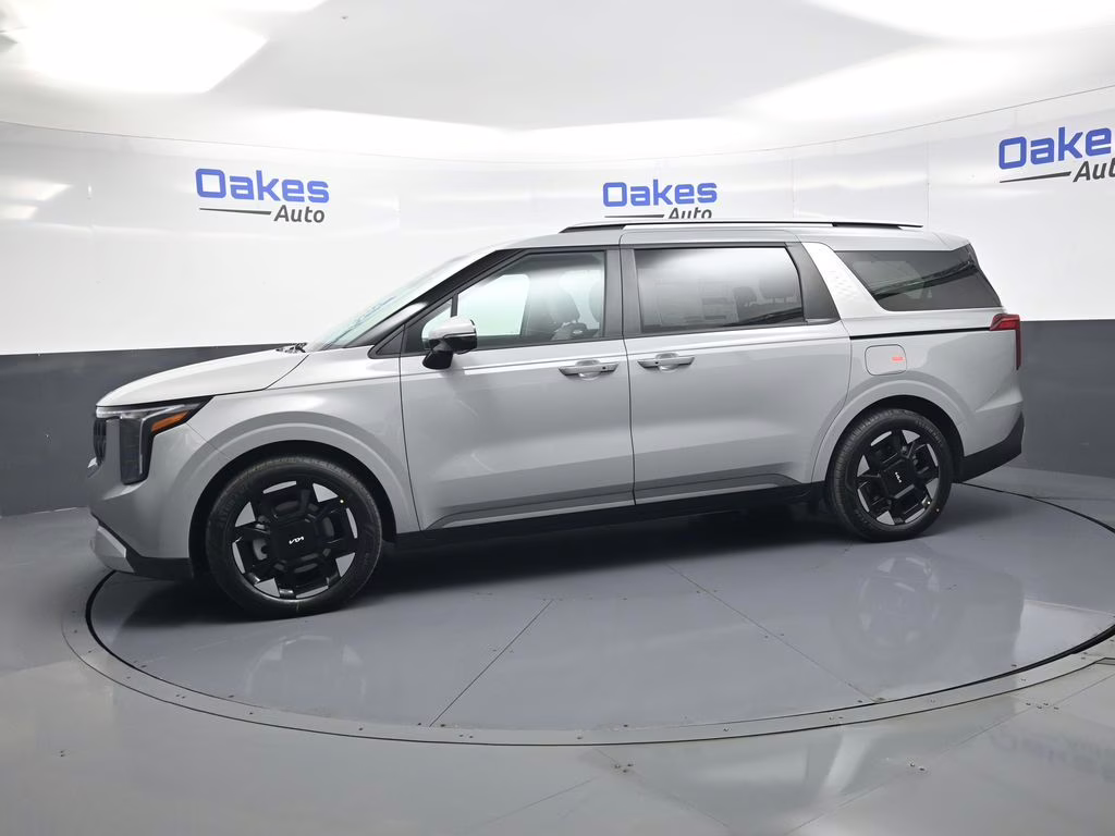 2026 Ceramic Silver Kia Carnival EX FWD Van