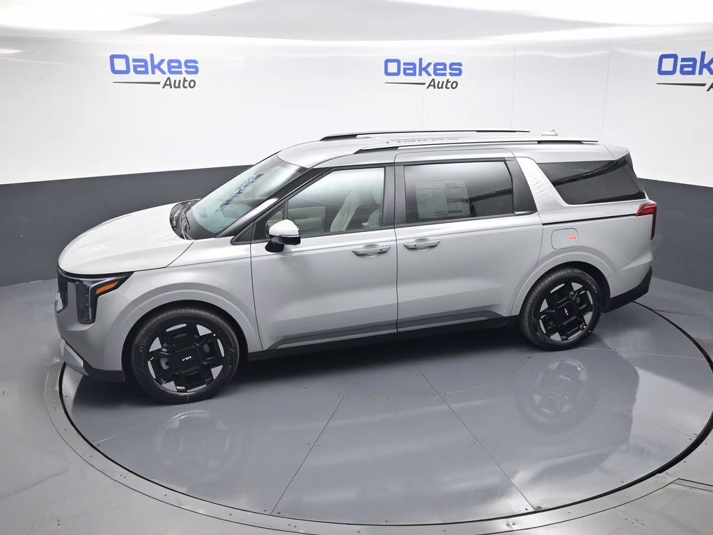 2026 Ceramic Silver Kia Carnival EX FWD Van