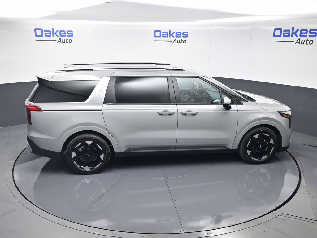 2026 Ceramic Silver Kia Carnival EX FWD Van