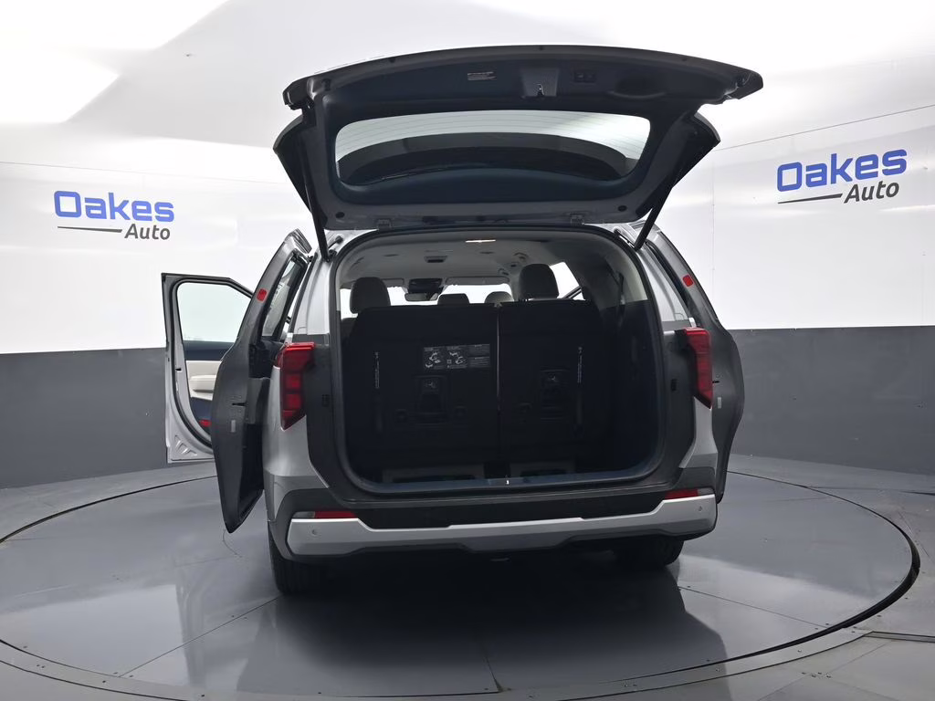 2026 Ceramic Silver Kia Carnival EX FWD Van