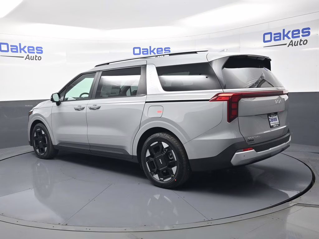 2026 Ceramic Silver Kia Carnival EX FWD Van