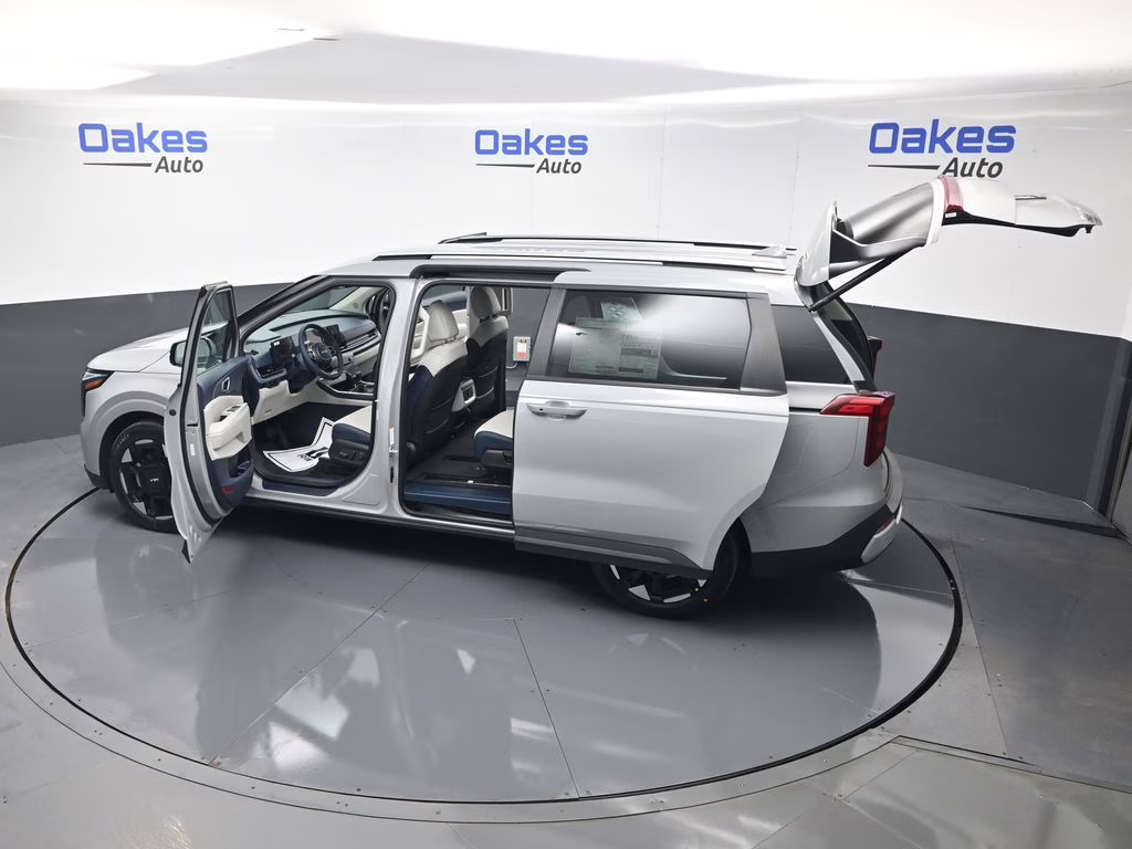2026 Ceramic Silver Kia Carnival EX FWD Van