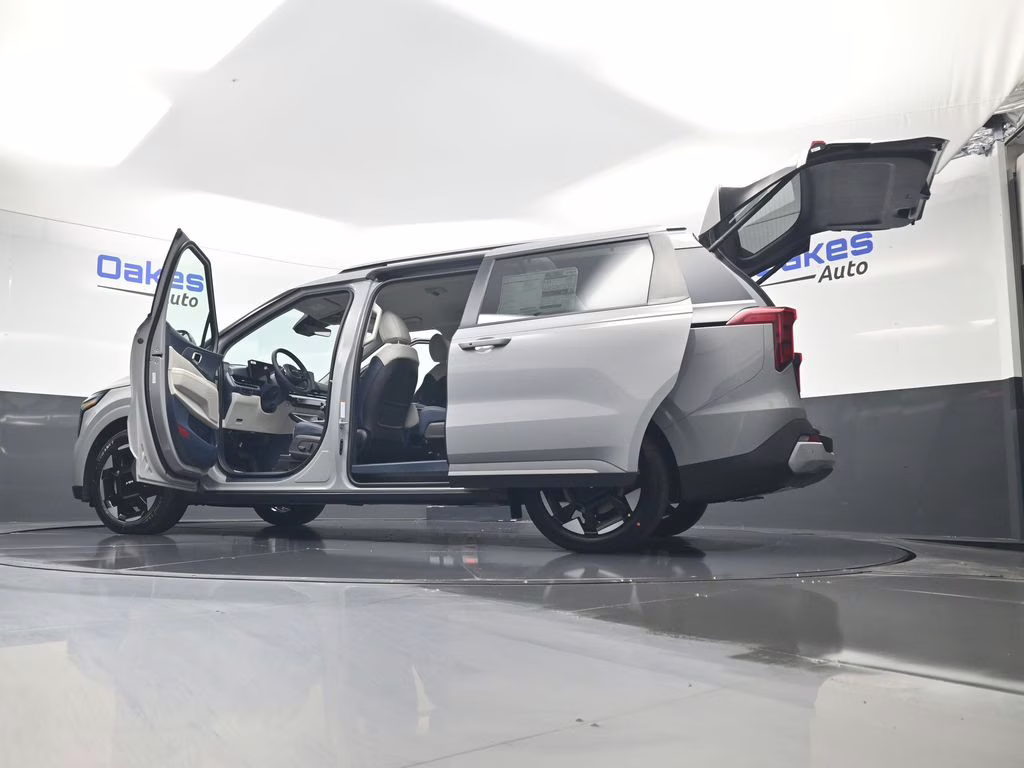 2026 Ceramic Silver Kia Carnival EX FWD Van