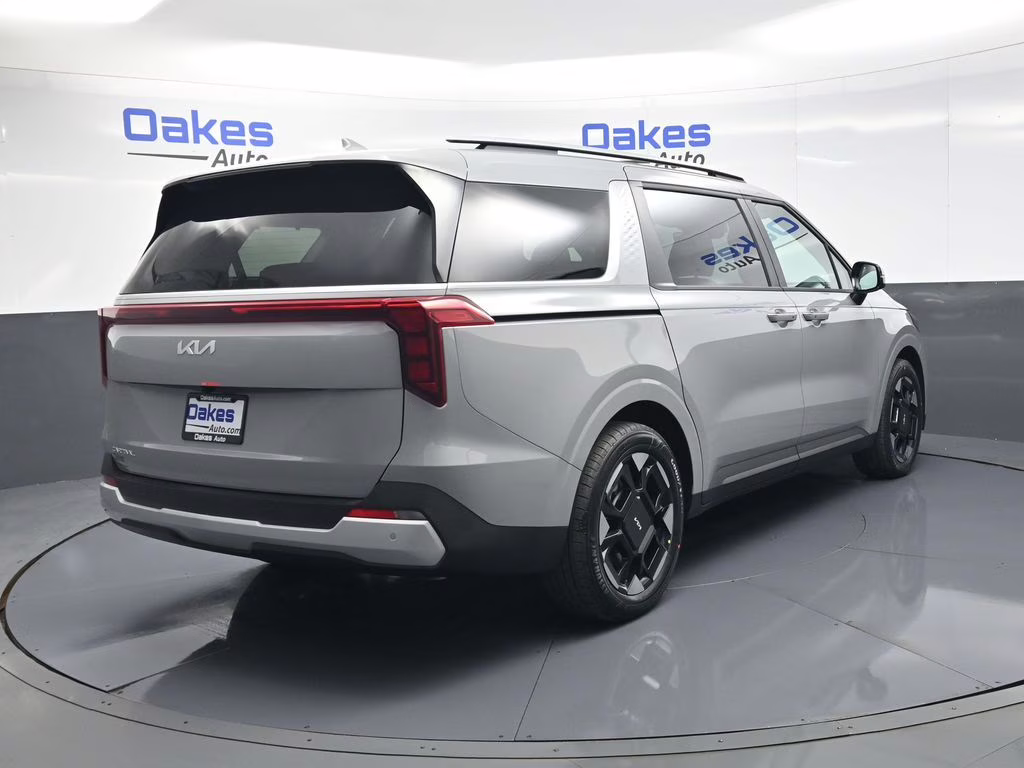 2026 Ceramic Silver Kia Carnival EX FWD Van