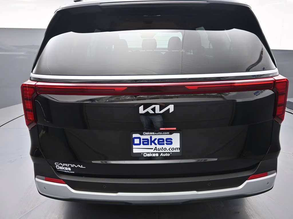 2026 Aurora Black Pearl Kia Carnival EX FWD Van