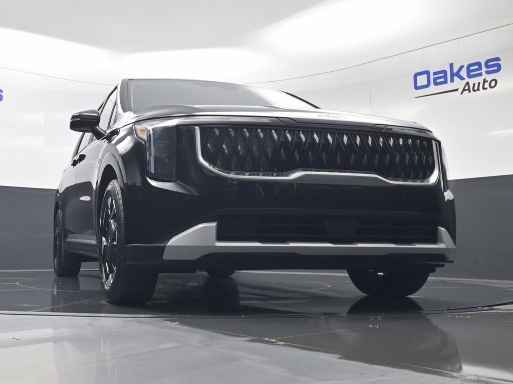 2026 Aurora Black Pearl Kia Carnival EX FWD Van