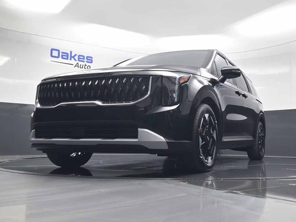 2026 Aurora Black Pearl Kia Carnival EX FWD Van