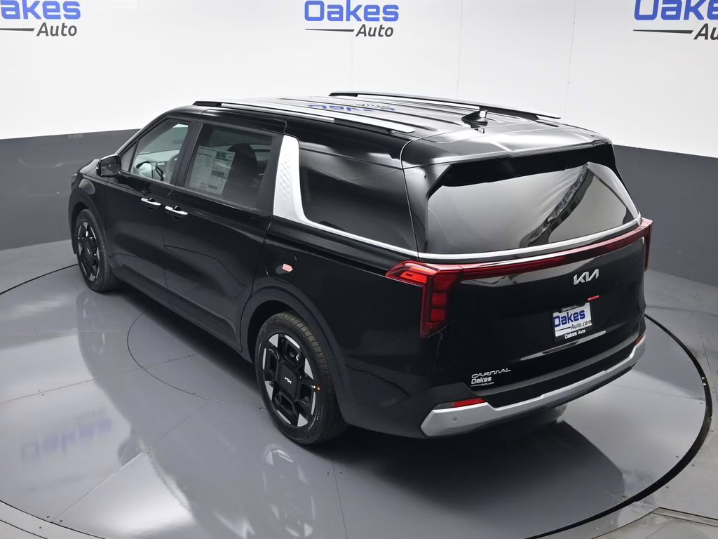 2026 Aurora Black Pearl Kia Carnival EX FWD Van