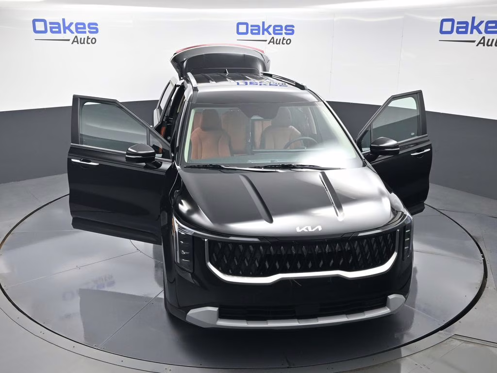 2026 Aurora Black Pearl Kia Carnival EX FWD Van