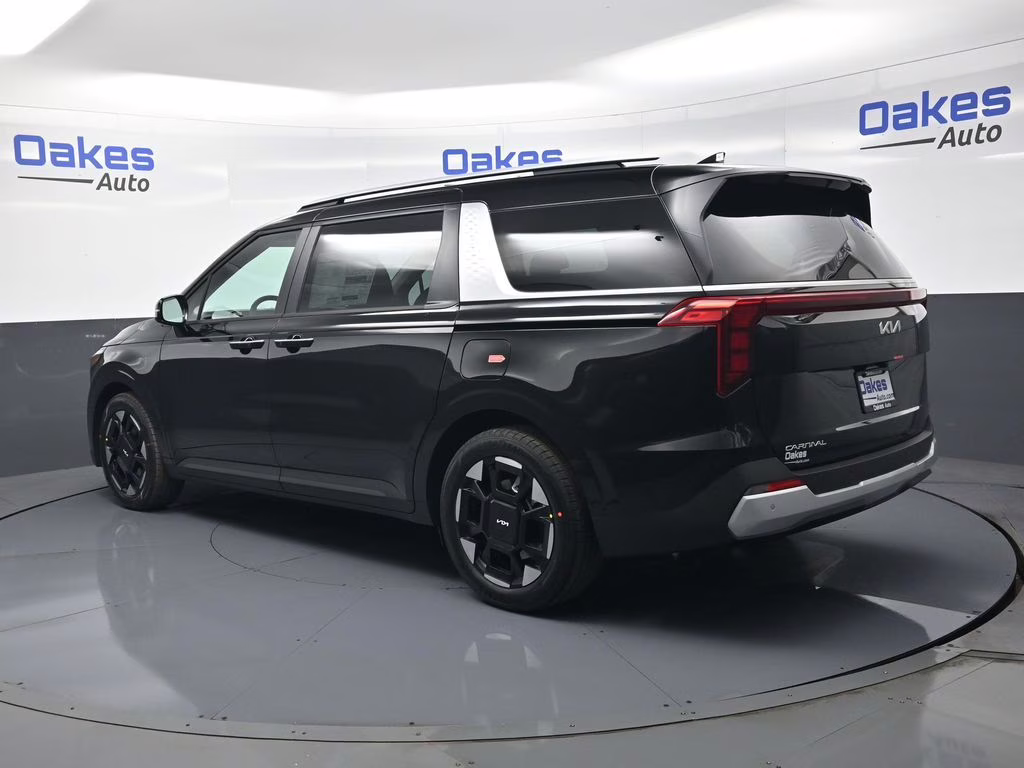 2026 Aurora Black Pearl Kia Carnival EX FWD Van