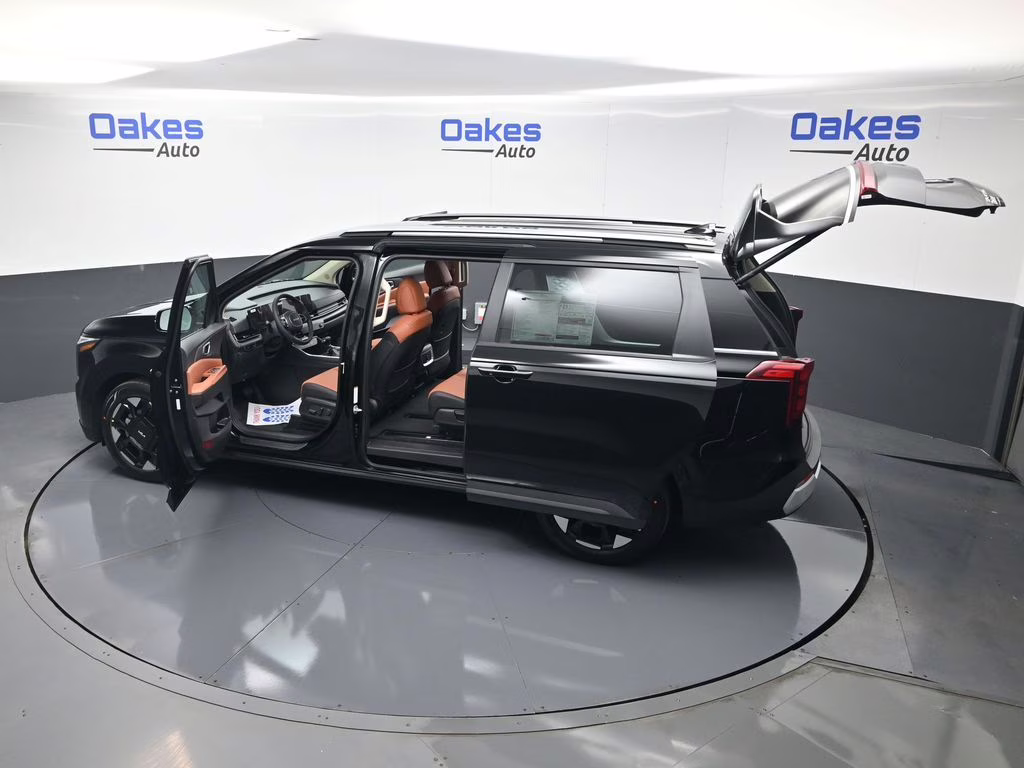 2026 Aurora Black Pearl Kia Carnival EX FWD Van