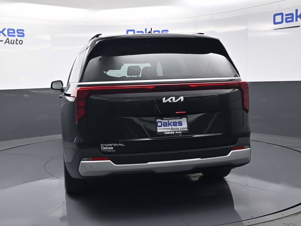 2026 Aurora Black Pearl Kia Carnival EX FWD Van