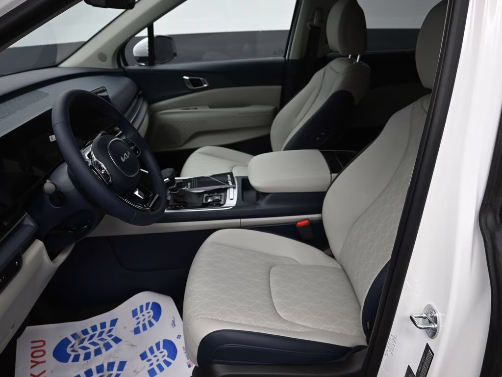 2026 Snow White Pearl Kia Carnival EX FWD Van