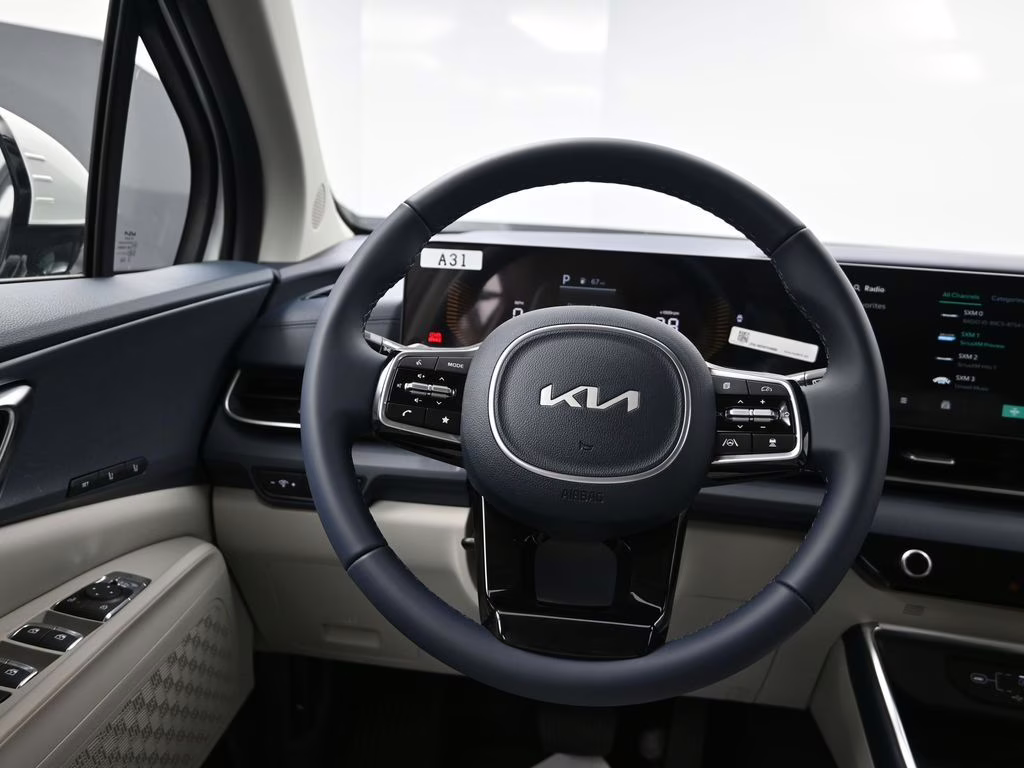 2026 Snow White Pearl Kia Carnival EX FWD Van