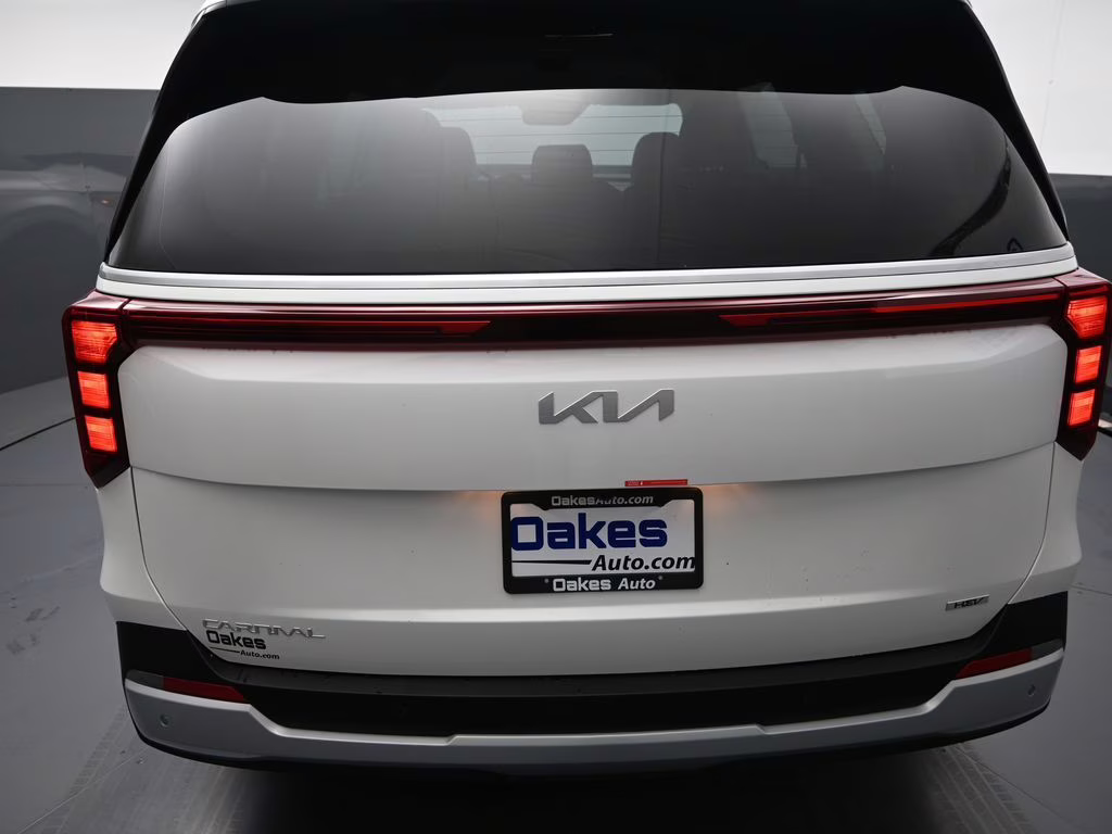 2026 Snow White Pearl Kia Carnival Hybrid EX FWD Van