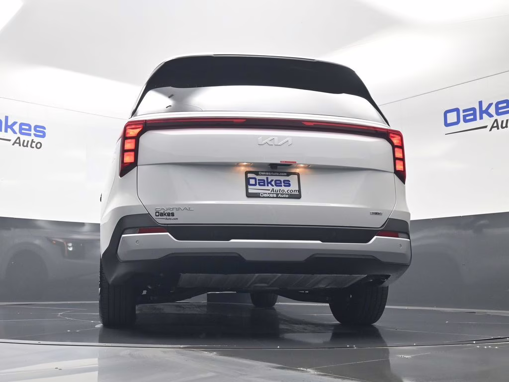 2026 Snow White Pearl Kia Carnival Hybrid EX FWD Van