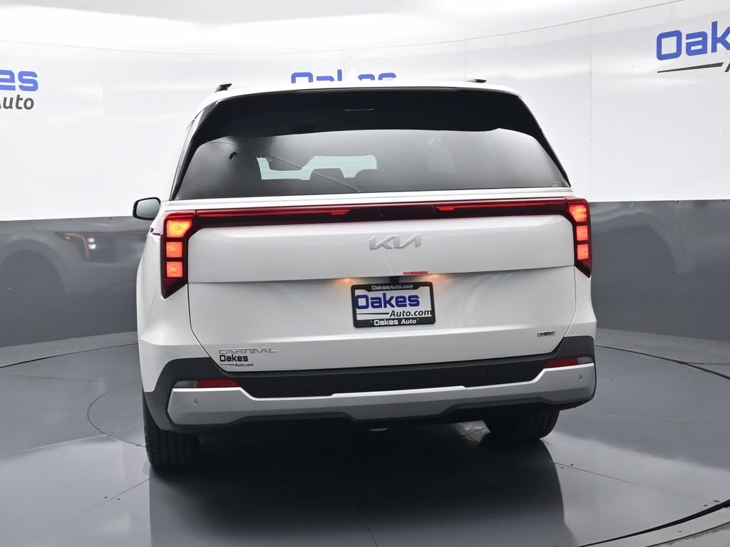 2026 Snow White Pearl Kia Carnival Hybrid EX FWD Van