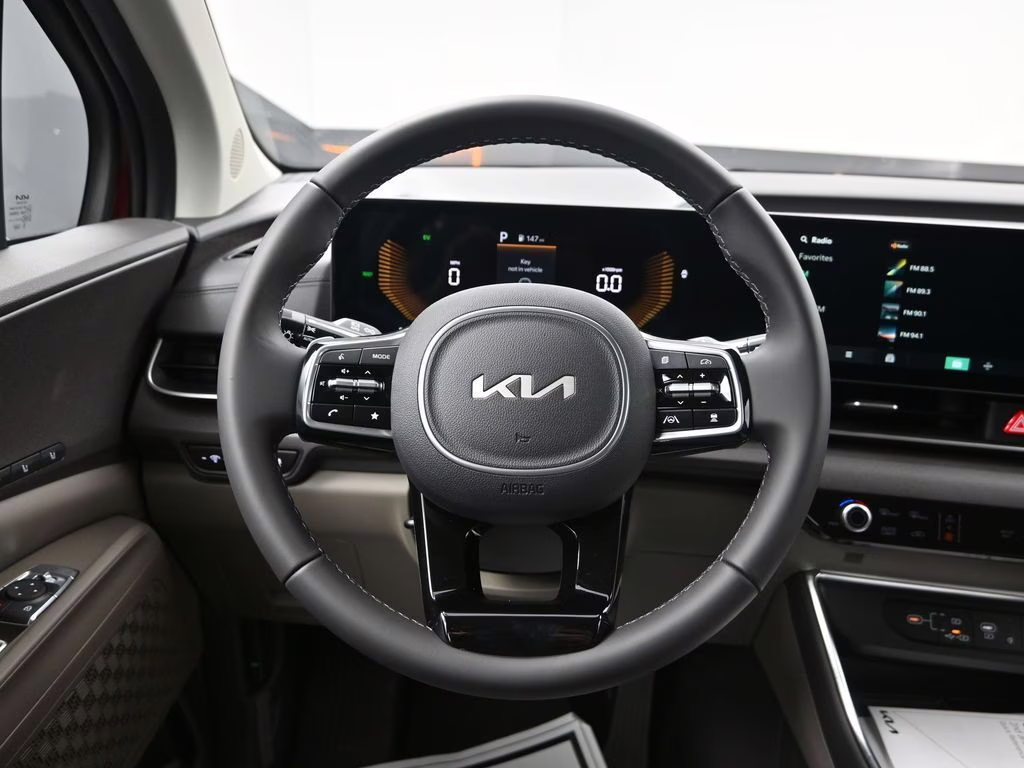 2026 Flare Red Kia Carnival Hybrid EX FWD Van