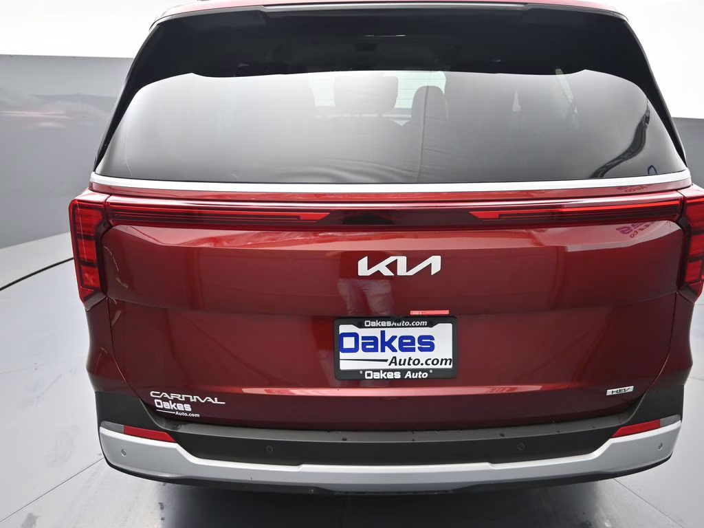 2026 Flare Red Kia Carnival Hybrid EX FWD Van
