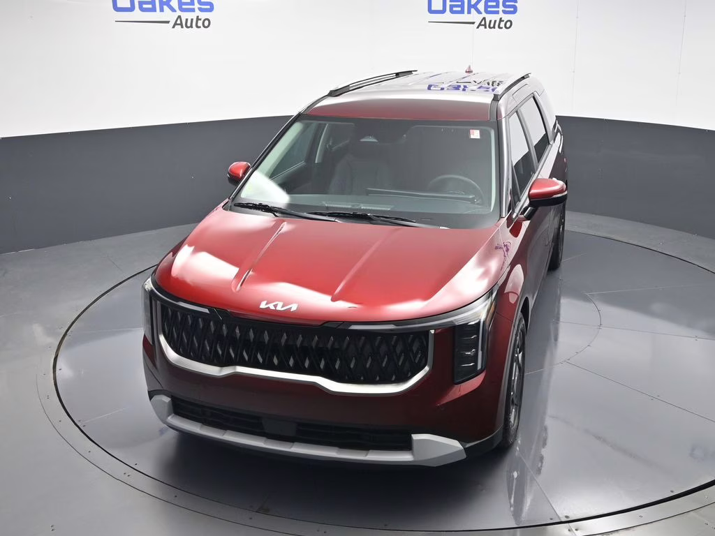 2026 Flare Red Kia Carnival Hybrid EX FWD Van