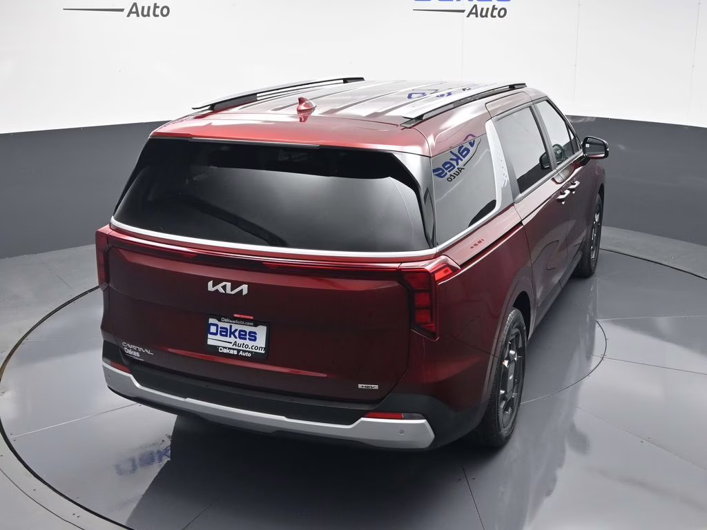 2026 Flare Red Kia Carnival Hybrid EX FWD Van