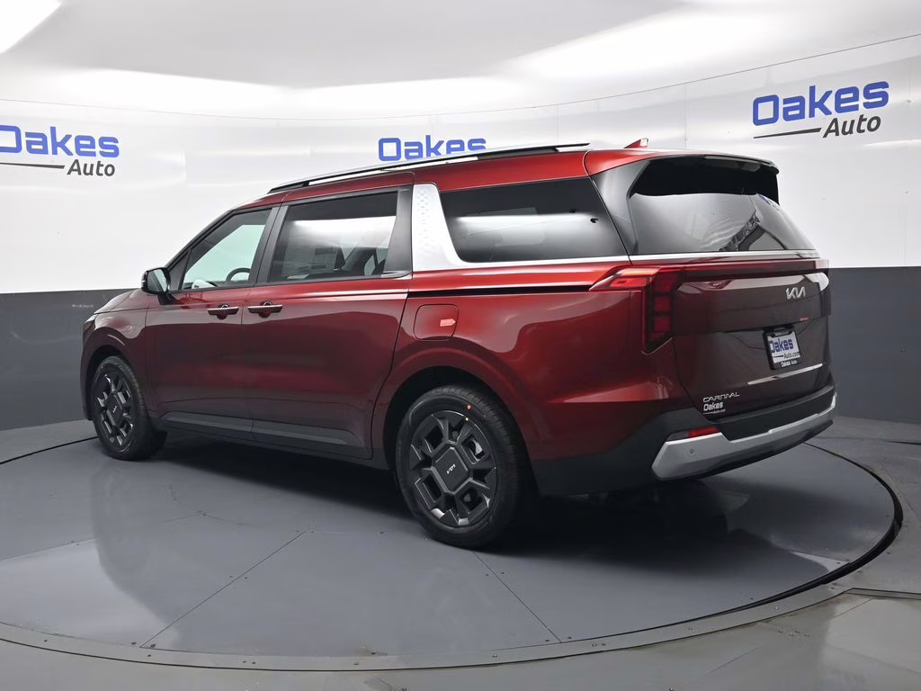 2026 Flare Red Kia Carnival Hybrid EX FWD Van