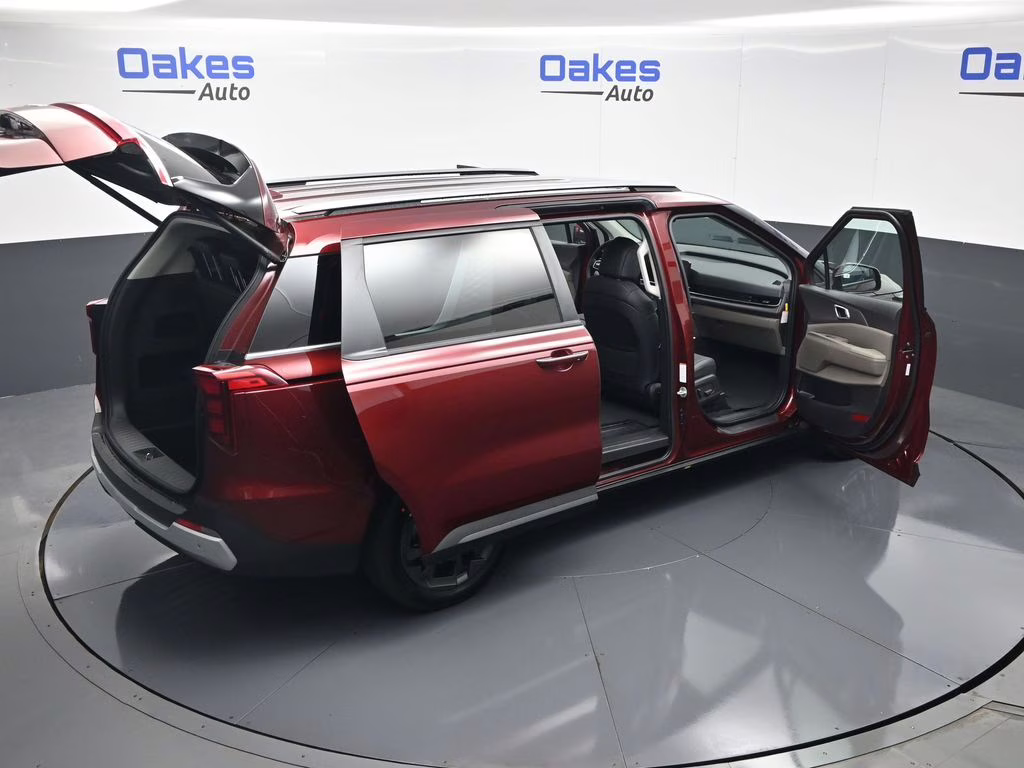 2026 Flare Red Kia Carnival Hybrid EX FWD Van