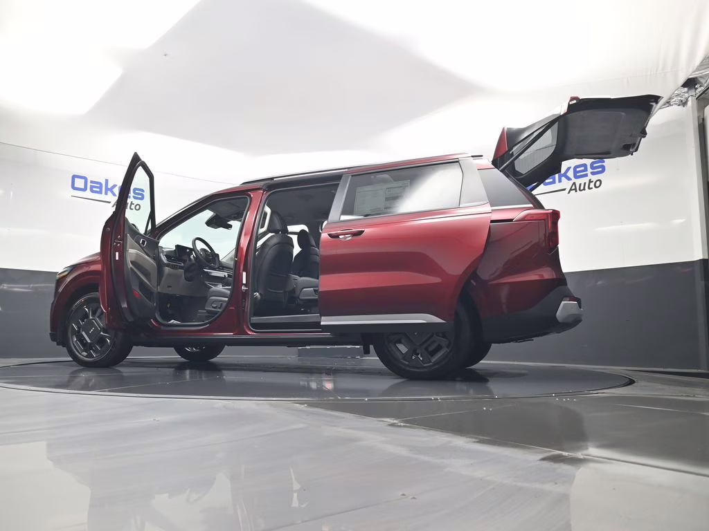 2026 Flare Red Kia Carnival Hybrid EX FWD Van