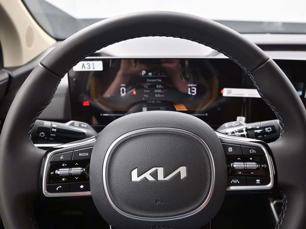 2026 Deep Chroma Blue Kia Carnival EX FWD Van