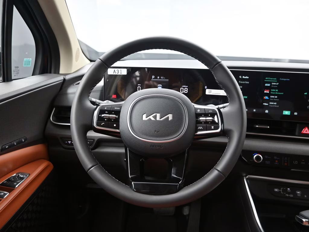 2026 Deep Chroma Blue Kia Carnival EX FWD Van