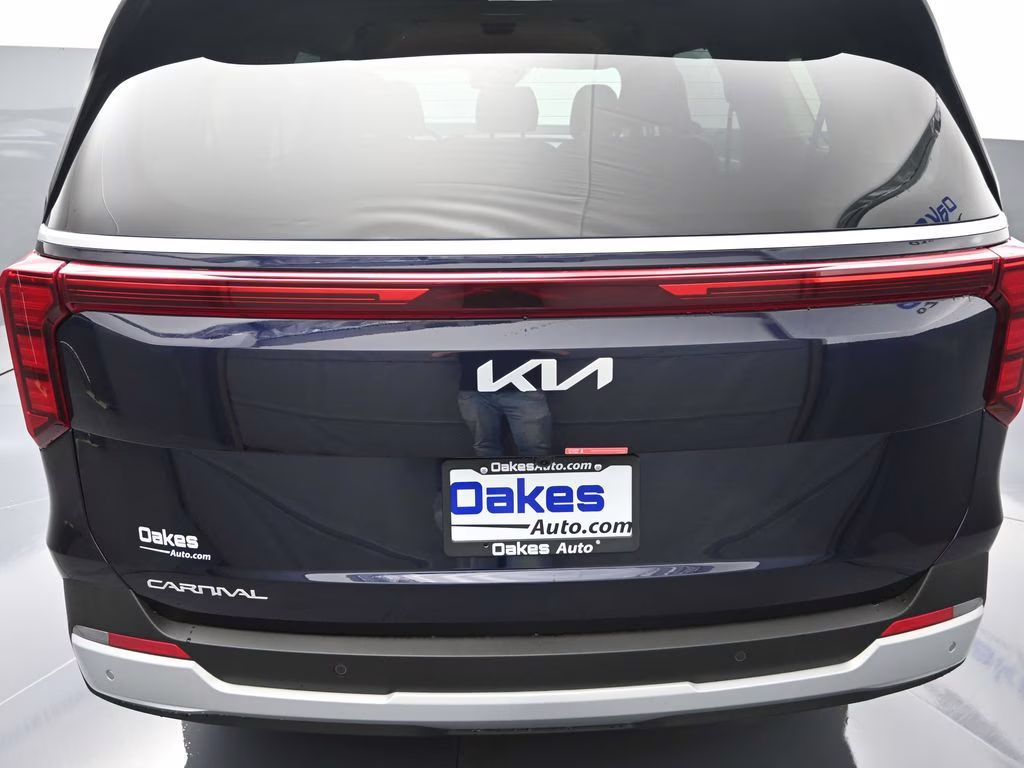 2026 Deep Chroma Blue Kia Carnival EX FWD Van