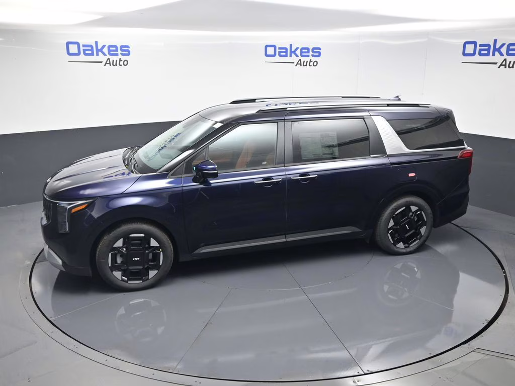 2026 Deep Chroma Blue Kia Carnival EX FWD Van
