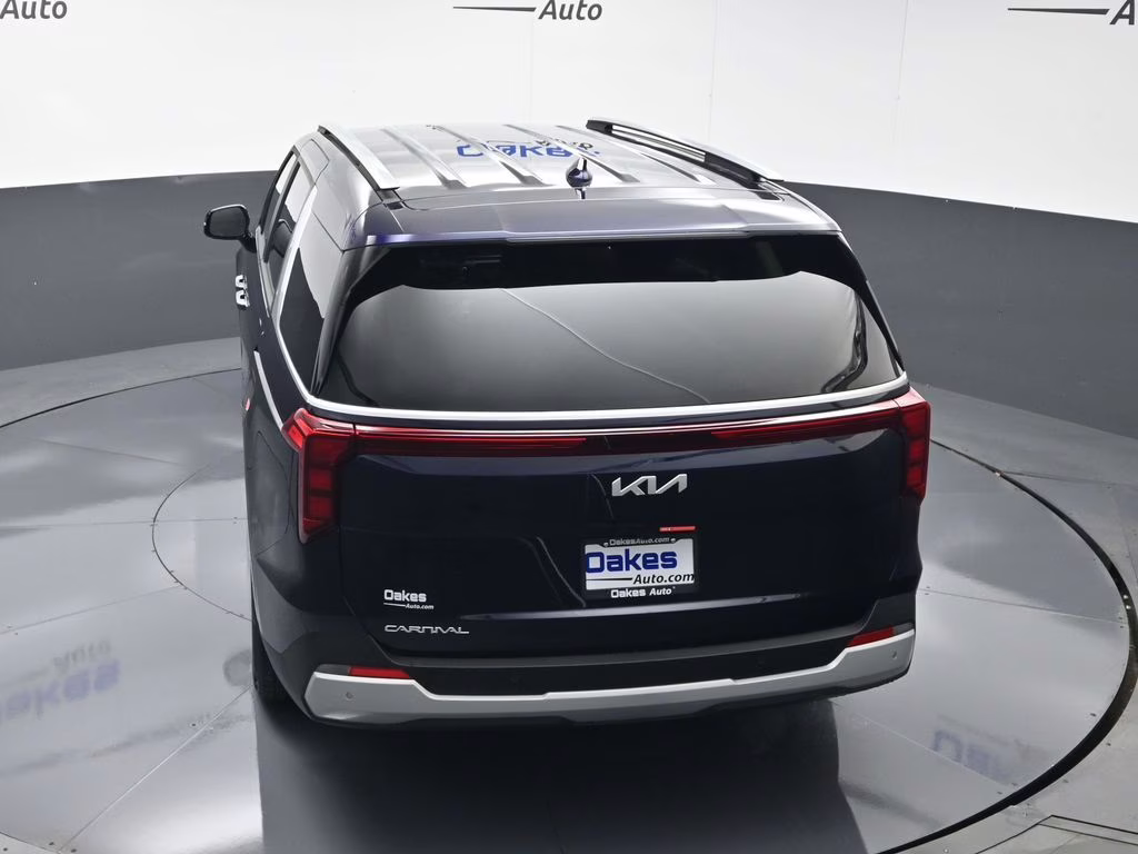 2026 Deep Chroma Blue Kia Carnival EX FWD Van