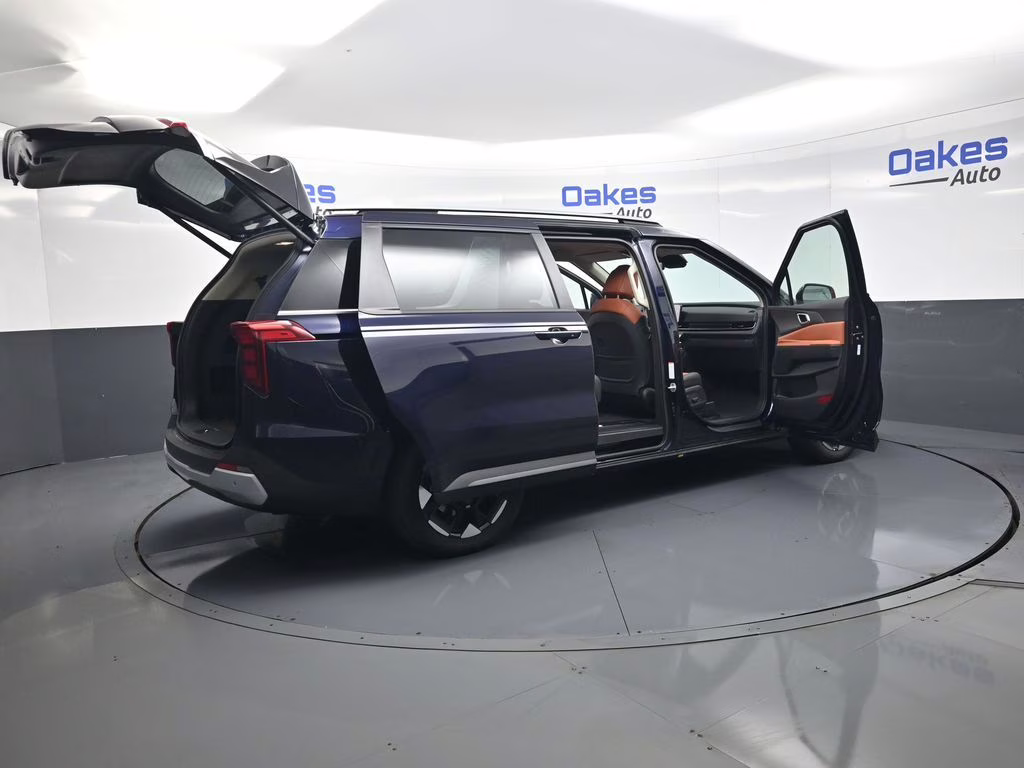 2026 Deep Chroma Blue Kia Carnival EX FWD Van