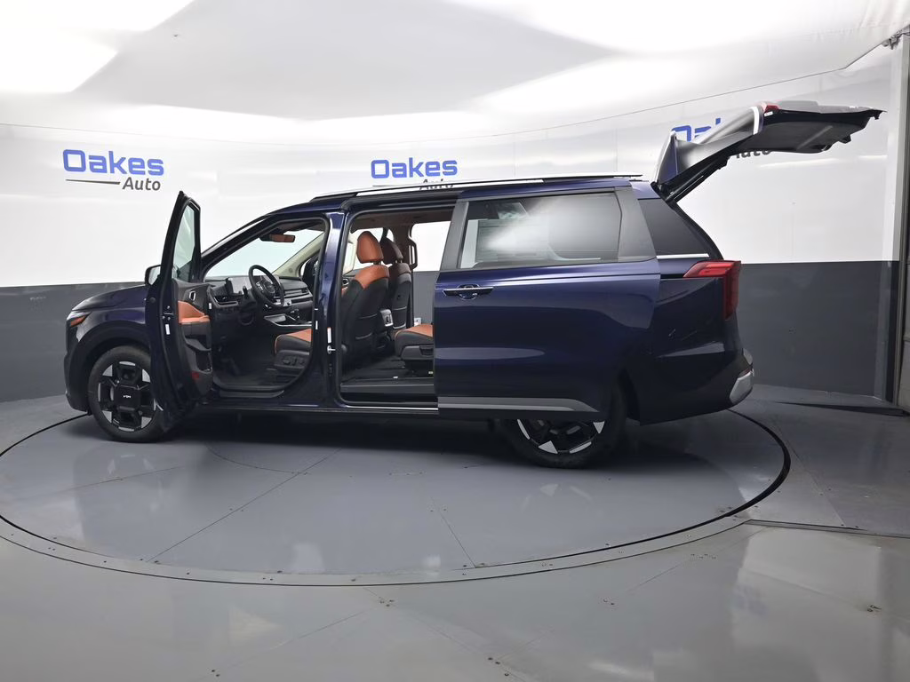 2026 Deep Chroma Blue Kia Carnival EX FWD Van