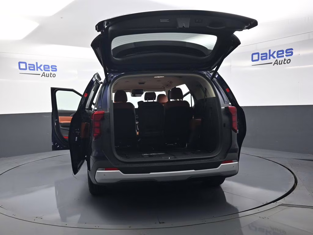 2026 Deep Chroma Blue Kia Carnival EX FWD Van