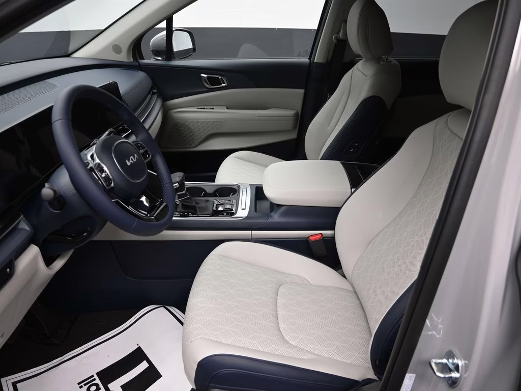 2026 Ceramic Silver Kia Carnival EX FWD Van